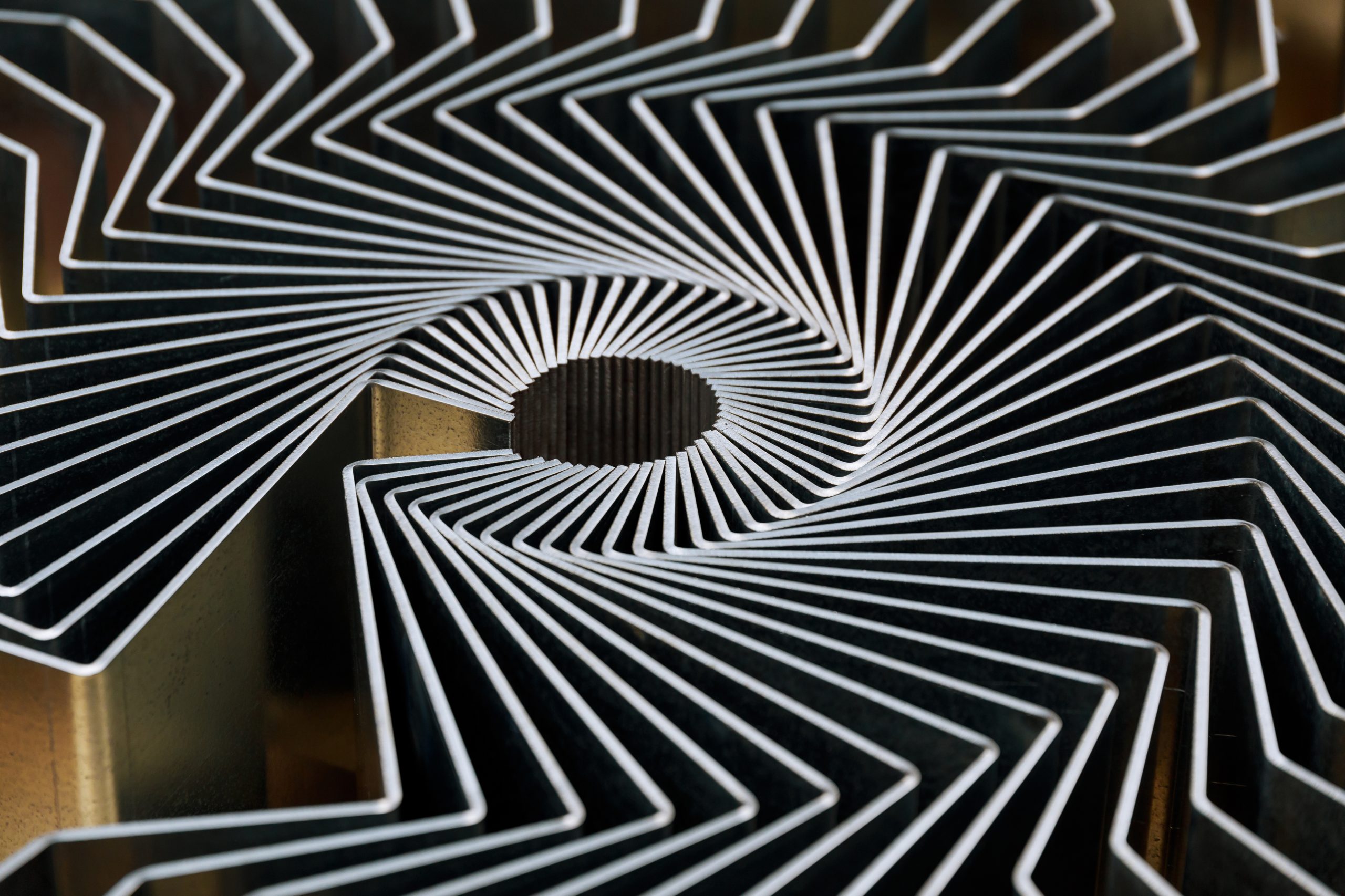 The finished product after bending on a sheet metal bending machine. Bending of various products at the metalworking plant.