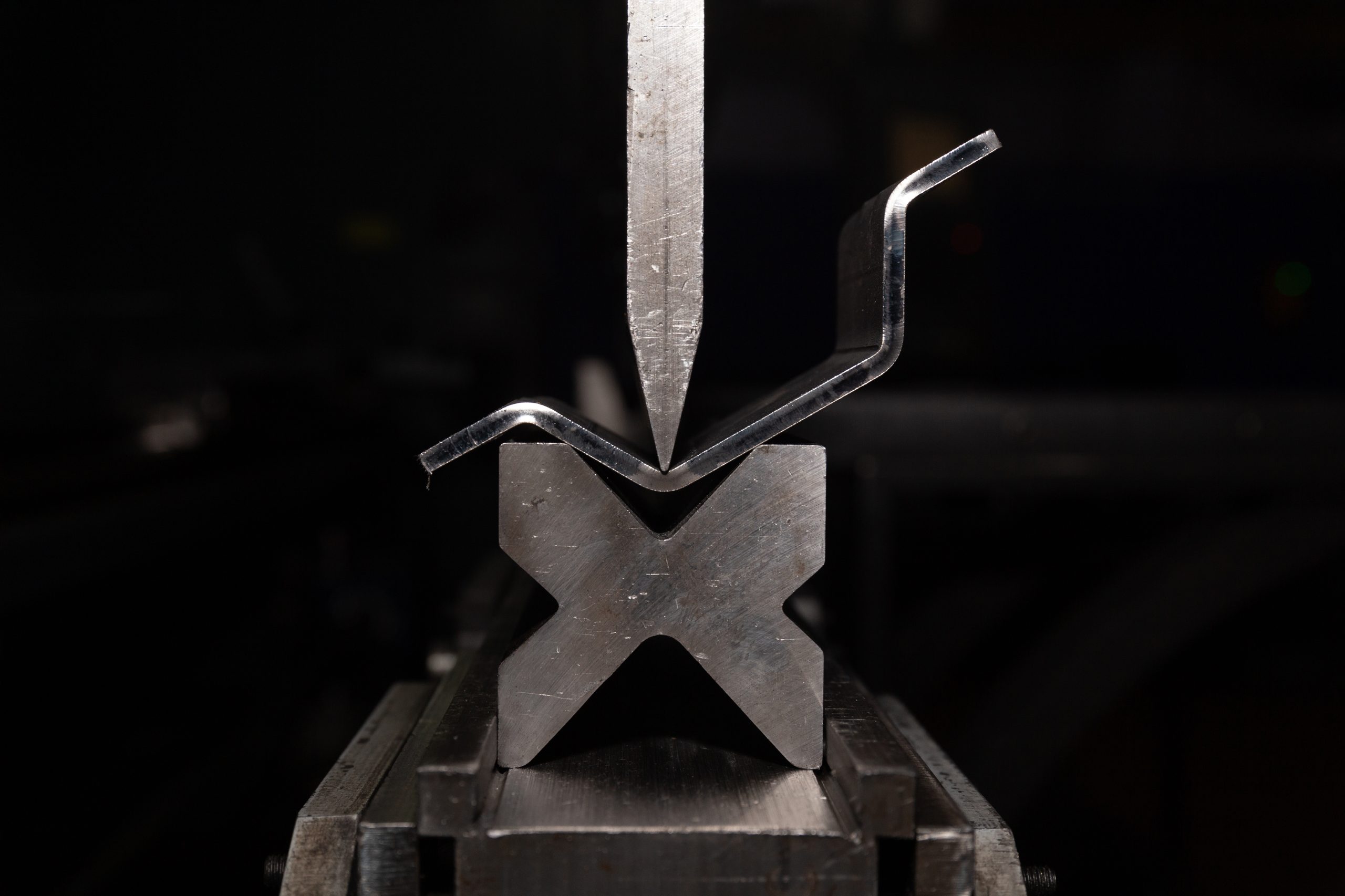 Working with sheet metal and special bending machines. hydraulic press brake or bending machine for sheet metal.